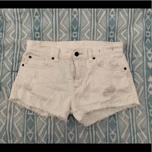 White distressed shorts